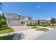Two story home with large driveway and landscaping at 15620 Panther Lake Dr, Winter Garden, FL 34787