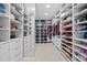 Large walk-in closet with ample shelving and hanging space at 15620 Panther Lake Dr, Winter Garden, FL 34787