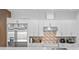 Modern kitchen with stainless steel appliances and a large island at 15620 Panther Lake Dr, Winter Garden, FL 34787