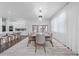 Spacious dining room with a contemporary design and kitchen views at 15620 Panther Lake Dr, Winter Garden, FL 34787