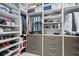 Organized walk-in closet with shelving and drawers at 15620 Panther Lake Dr, Winter Garden, FL 34787