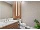 Modern powder room with sleek vanity and updated fixtures at 15620 Panther Lake Dr, Winter Garden, FL 34787