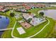 Community overview with pool, playground, and clubhouse near lake at 15620 Panther Lake Dr, Winter Garden, FL 34787