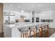 Modern kitchen with white cabinetry, a large island, and stainless steel appliances at 15620 Panther Lake Dr, Winter Garden, FL 34787