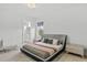 Bright bedroom with plush bed and ensuite bathroom access at 15620 Panther Lake Dr, Winter Garden, FL 34787