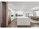 Modern kitchen with stainless steel appliances and white cabinetry at 15620 Panther Lake Dr, Winter Garden, FL 34787