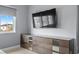 Spacious bedroom with large TV and built-in dresser at 15620 Panther Lake Dr, Winter Garden, FL 34787