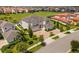 Luxury home with a large driveway and beautiful landscaping at 15620 Panther Lake Dr, Winter Garden, FL 34787