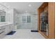 Elegant bathroom with double vanity, large shower, and sauna at 15620 Panther Lake Dr, Winter Garden, FL 34787