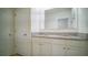 Bathroom with double vanity and granite countertop at 2378 White Lilly Dr, Kissimmee, FL 34747