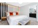 Spacious main bedroom with a plush bed and ensuite bathroom access at 1038 Splash Shot Pl, Davenport, FL 33896