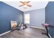 Bedroom with ceiling fan and ample closet space at 104 Langham Dr, Davenport, FL 33897