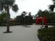Pool area with shaded cabanas and comfortable seating at 5265 Oakbourne Ave, Davenport, FL 33837