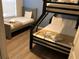 Bedroom with twin and full-size beds, perfect for guests at 5265 Oakbourne Ave, Davenport, FL 33837