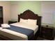 Spacious Primary bedroom with a king-size bed and nightstands at 5265 Oakbourne Ave, Davenport, FL 33837