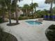 Community hot tub surrounded by landscaping at 5265 Oakbourne Ave, Davenport, FL 33837