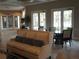 Relaxing community room with couches and tables at 5265 Oakbourne Ave, Davenport, FL 33837