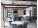 Community room with tables, chairs, and fireplace at 5265 Oakbourne Ave, Davenport, FL 33837