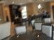 Community room with bar and seating area at 5265 Oakbourne Ave, Davenport, FL 33837