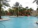 Large community pool with two waterslides at 5265 Oakbourne Ave, Davenport, FL 33837