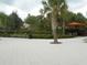 Landscaped pool area with walkways and plenty of seating at 5265 Oakbourne Ave, Davenport, FL 33837
