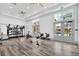 Fitness center with rowing machines, weights, and other workout equipment at 1862 Beach Ridge Rd, Celebration, FL 34747