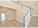Elegant staircase with gray and white railings at 1862 Beach Ridge Rd, Celebration, FL 34747