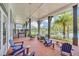 Relaxing community patio with brick pavers, comfortable seating, and scenic views at 1862 Beach Ridge Rd, Celebration, FL 34747