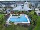 Resort-style pool with lounge chairs and clubhouse in background at 1862 Beach Ridge Rd, Celebration, FL 34747