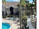 Community spa and pool with surrounding landscaping at 3100 Parkway Blvd # 712, Kissimmee, FL 34747