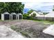 Large backyard with three sheds and space for landscaping at 1411 Overdale St, Orlando, FL 32825