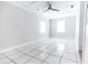 Bright bedroom with tile floors and ceiling fan at 1411 Overdale St, Orlando, FL 32825