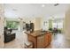 Kitchen features granite countertops, stainless steel appliances, and an island at 790 Shady Canyon Way, Poinciana, FL 34759