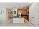 Open kitchen boasts granite countertops and stainless steel appliances at 790 Shady Canyon Way, Poinciana, FL 34759