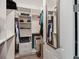 Spacious walk-in closet with ample shelving and hanging space at 790 Shady Canyon Way, Poinciana, FL 34759