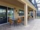 Covered patio with multiple seating areas at 3801 Sonoma Blvd, Kissimmee, FL 34741