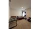 Simple bedroom with a daybed and work space at 5569 Oro Valley Rd, Auburndale, FL 33823