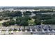 Neighborhood view showcasing several houses and surrounding landscape at 5569 Oro Valley Rd, Auburndale, FL 33823