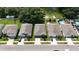 Row of houses viewed from above, showing rooftops and yards at 5569 Oro Valley Rd, Auburndale, FL 33823