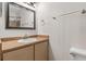 Bathroom with vanity, mirror, and a toilet at 3032 Parkway Blvd # 201, Kissimmee, FL 34747