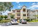 Two-story condo building with ample parking at 3032 Parkway Blvd # 201, Kissimmee, FL 34747