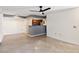 Open living area with tile floors and a ceiling fan at 3032 Parkway Blvd # 201, Kissimmee, FL 34747