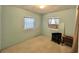 Bedroom with carpet, window, and electric fireplace at 1206 Osceola Ave, Tavares, FL 32778