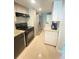Modern kitchen with granite countertops and stainless steel appliances at 5341 Indian Creek Dr # B, Orlando, FL 32811