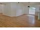 Bright dining area with light wood floors and large window at 1025 W Lake Hamilton Dr, Winter Haven, FL 33881