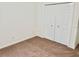 Double-door closet in a well-lit bedroom at 1025 W Lake Hamilton Dr, Winter Haven, FL 33881