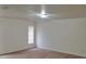 Spacious bedroom with neutral carpeting and window coverings at 1025 W Lake Hamilton Dr, Winter Haven, FL 33881