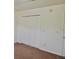 Ample closet space with double-door mirrored wardrobe at 1025 W Lake Hamilton Dr, Winter Haven, FL 33881