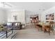 Open-concept living space with dining area and hardwood floors at 1370 Tuscan Ter # 2104, Davenport, FL 33896