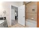 Bathroom with shower, tub and granite vanity at 1370 Tuscan Ter # 2104, Davenport, FL 33896